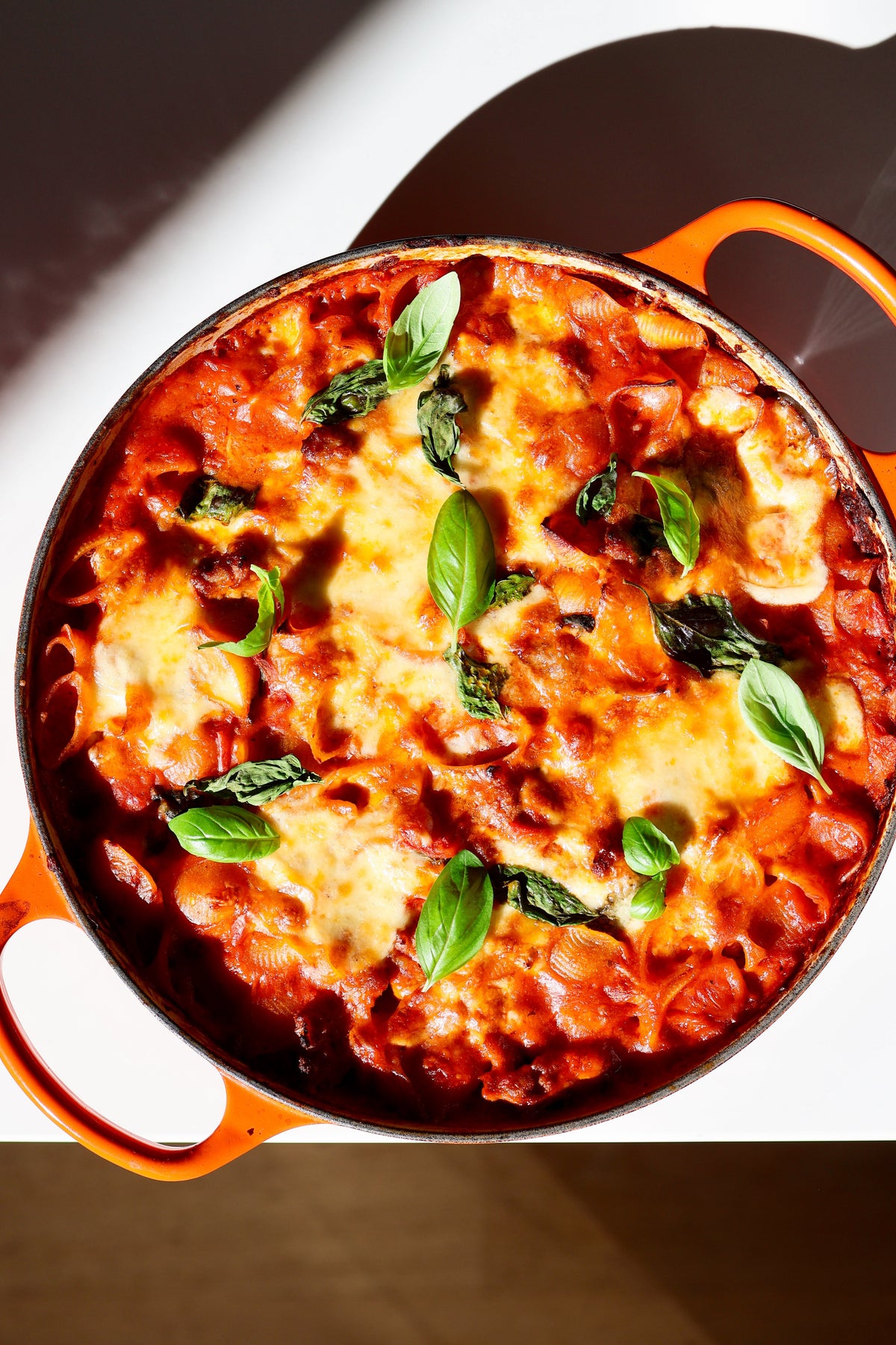 Creamy tomato and sausage protein packed pasta bake.