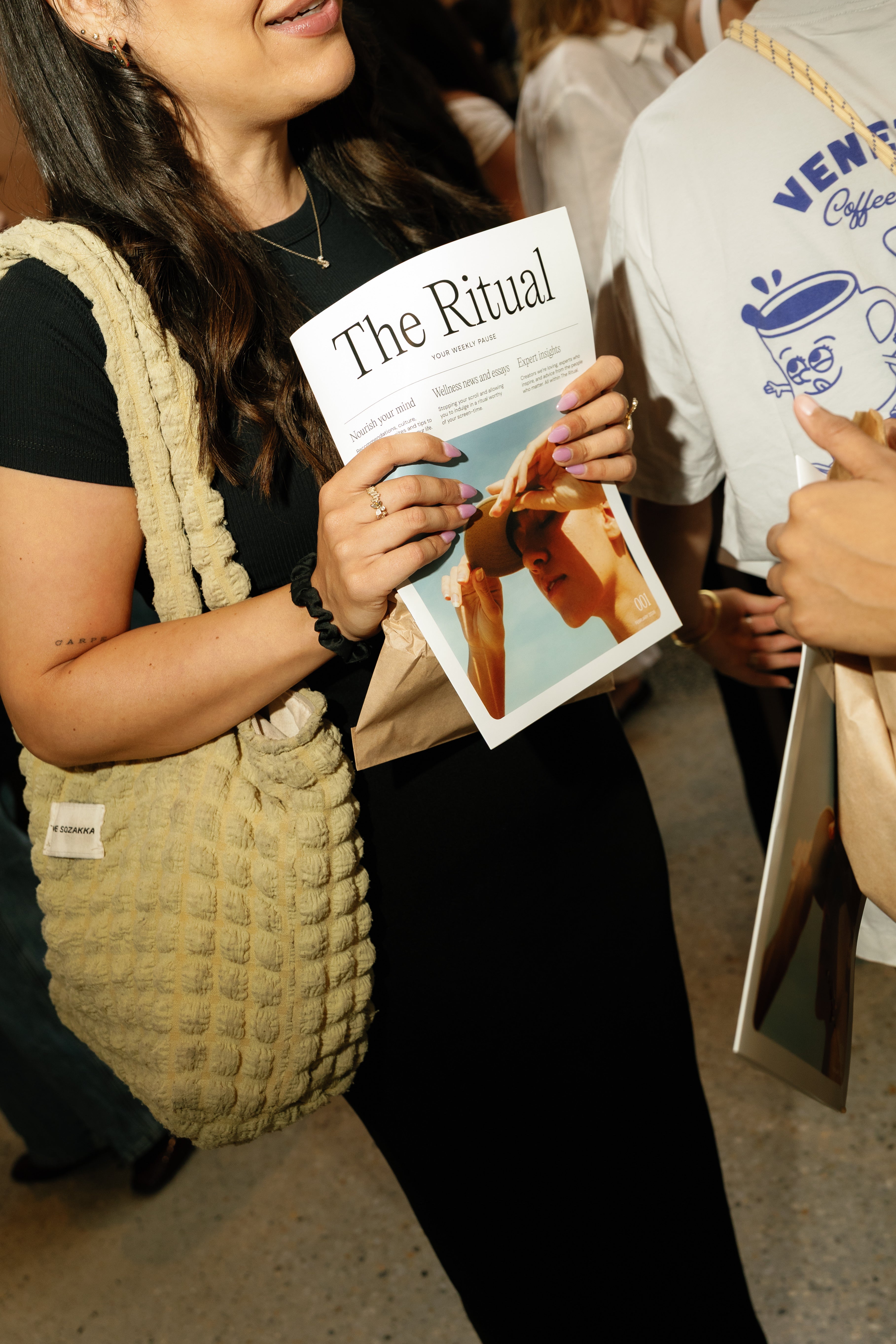 Women holding a magazine