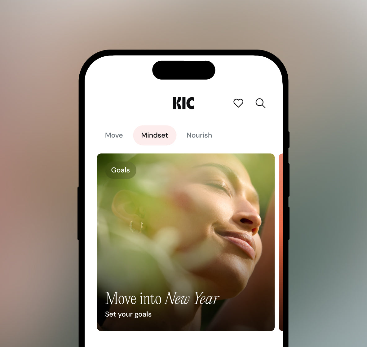 Smartphone displaying a KIC app interface with a woman's face and motivational text on a blurred background