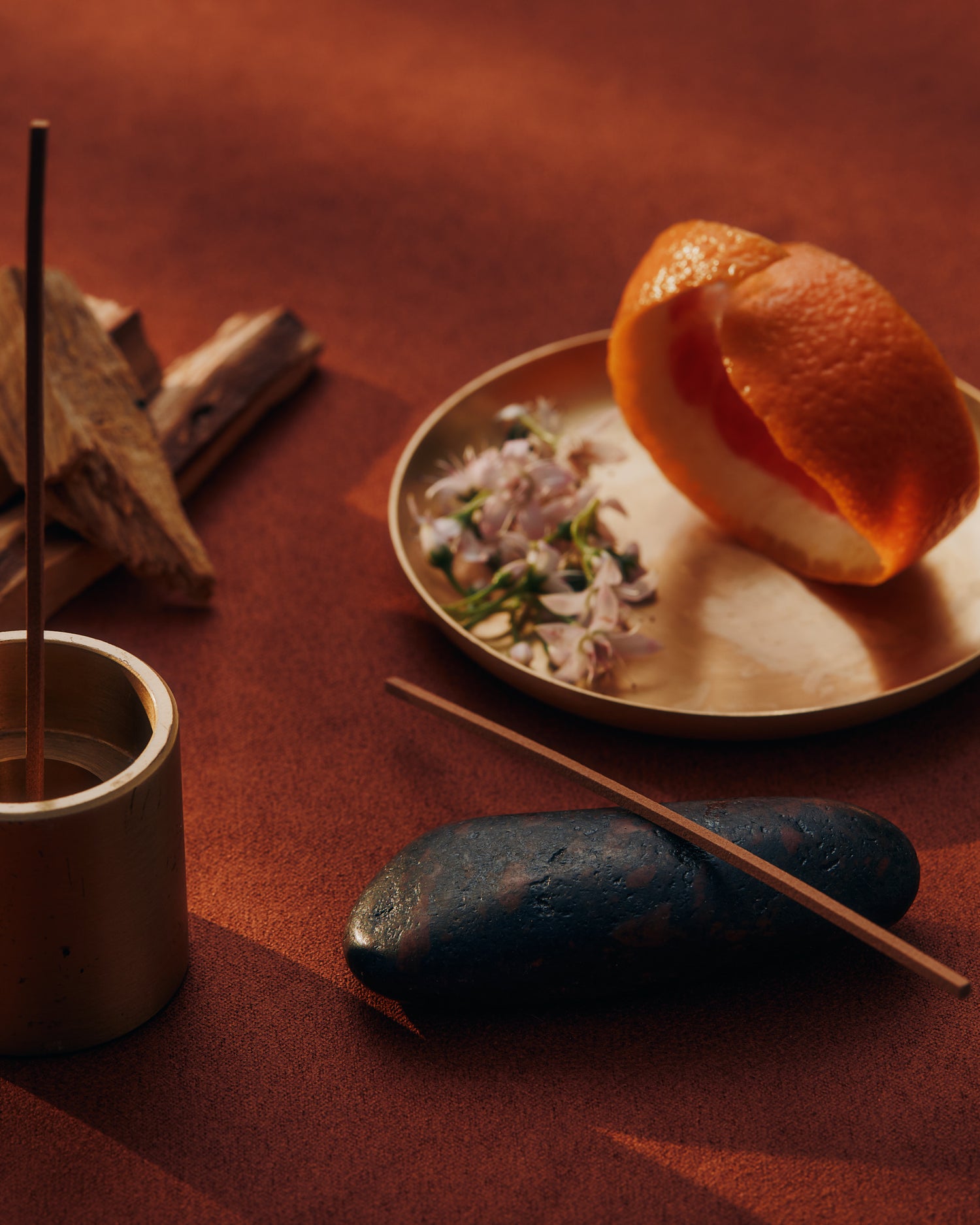 KIC Power incense burning in a bowl with cloves and cedarwood