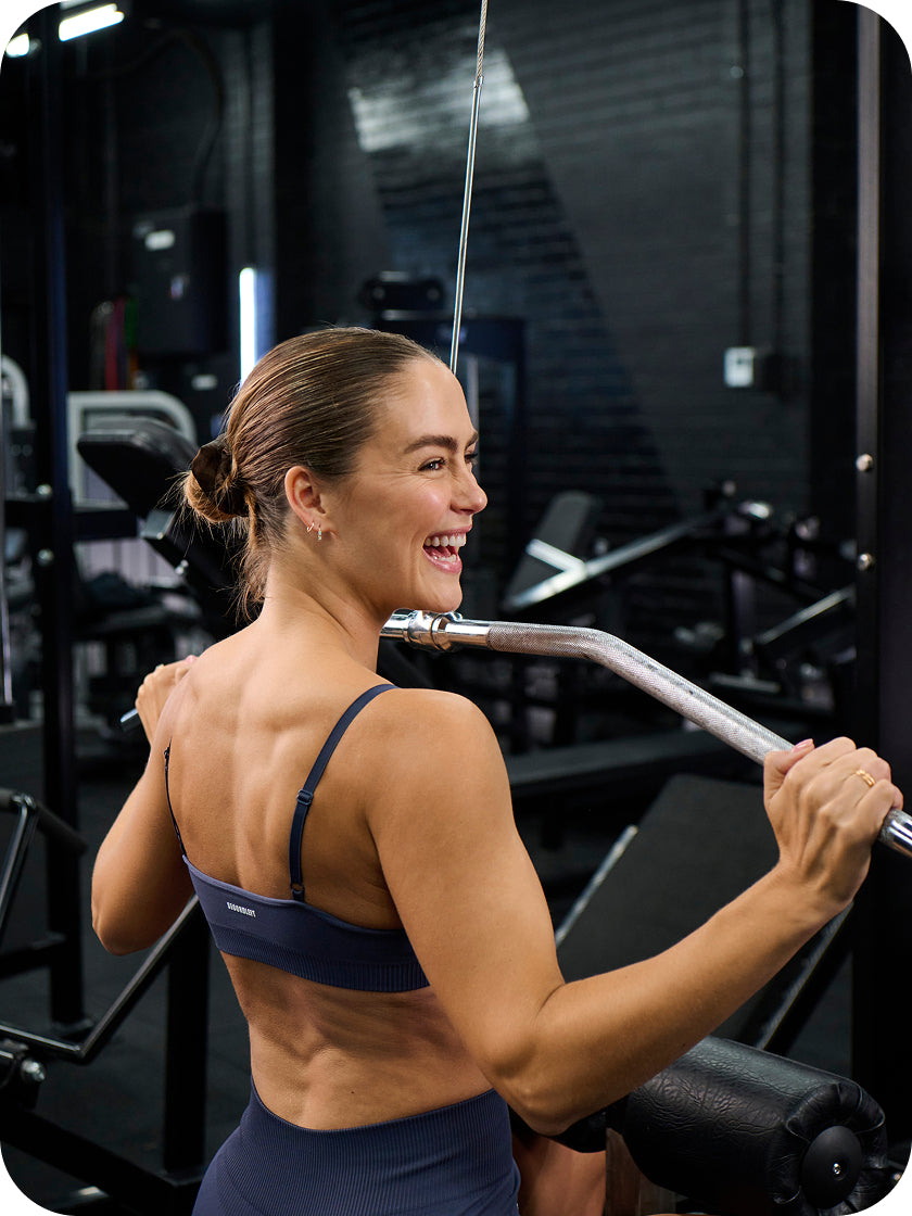 Woman exercising in a gym setting